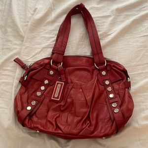 B. Makowsky red leather purse